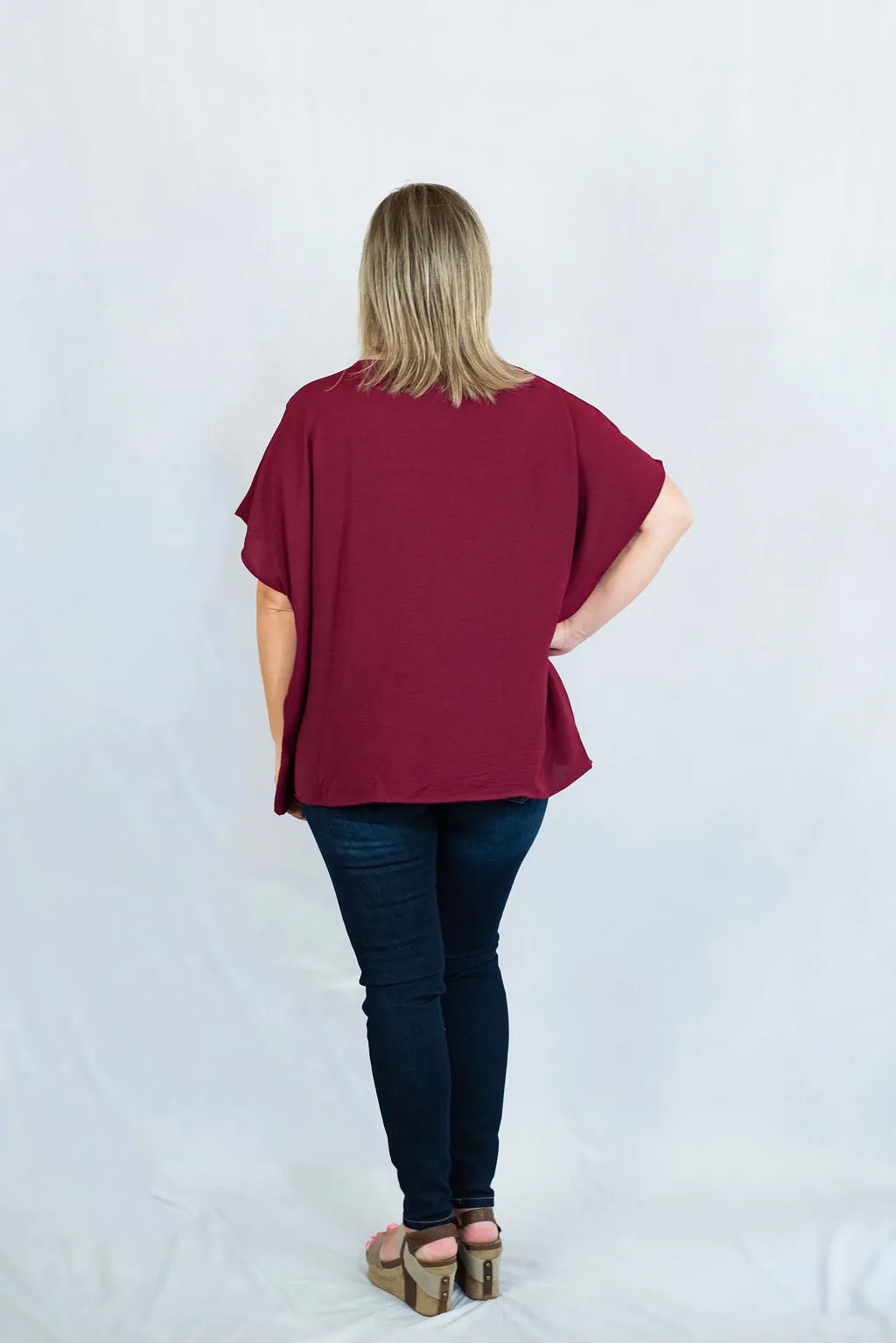 V-Neck Short Sleeve Blouse with Placket Detail by Entro Clothing